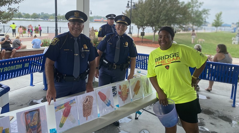 Police officers and community member
