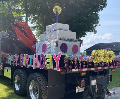 Giant birthday cake float