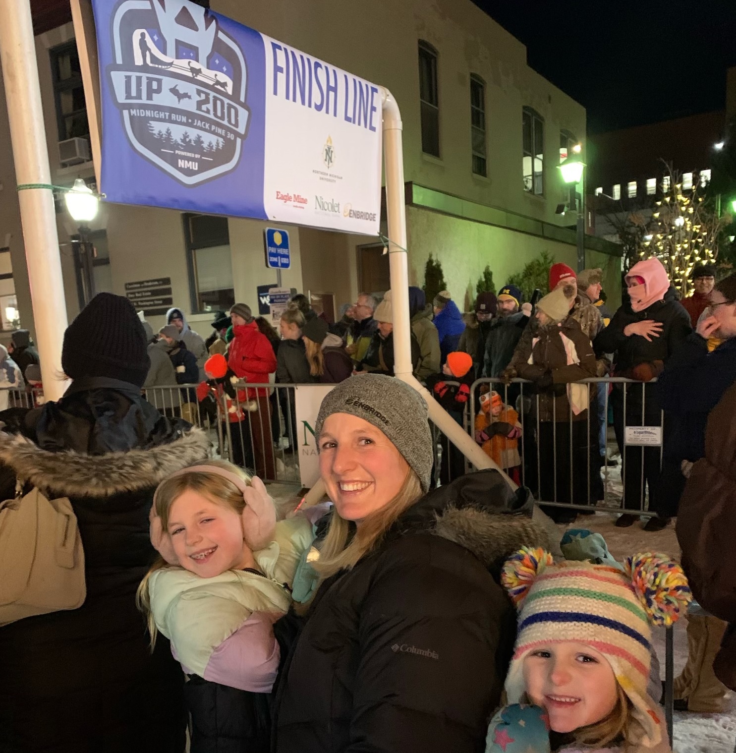 Woman with kids at winter festival